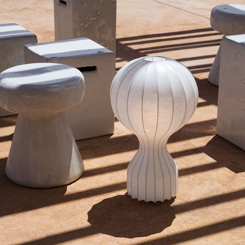 The large Gatto Table Lamp from FLOS in a display.