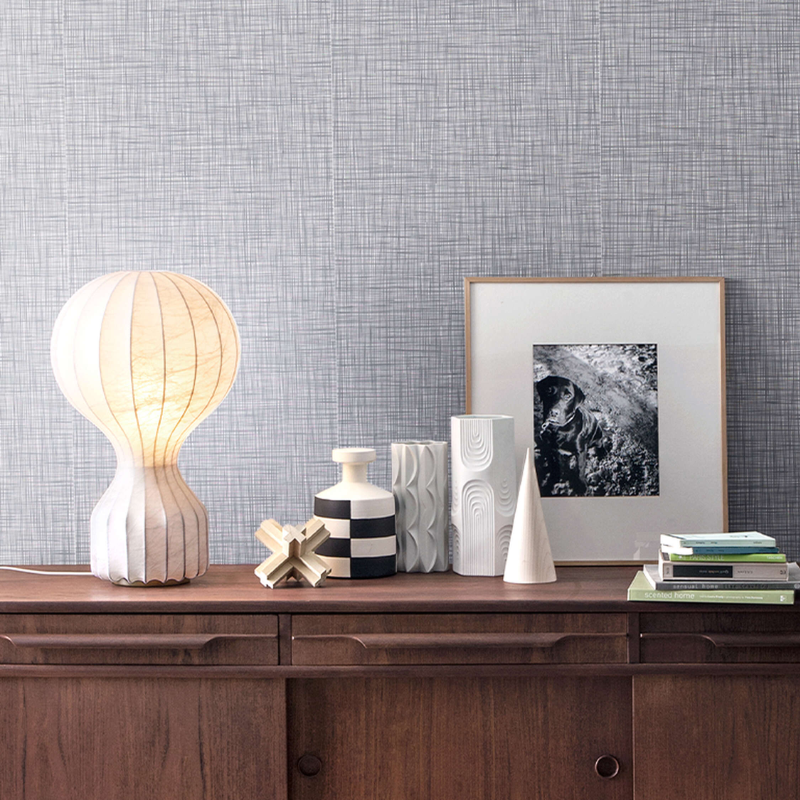 The large Gatto Table Lamp from FLOS in an office.