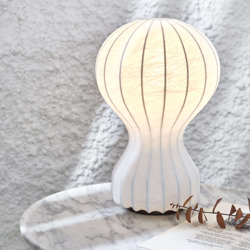 The small Gatto Table Lamp from FLOS in a designer home.