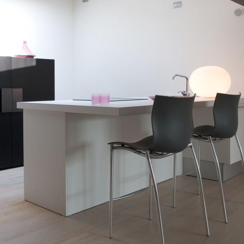 The 17 inch Glo-Ball Basic Table Lamp from Flos in a kitchen.