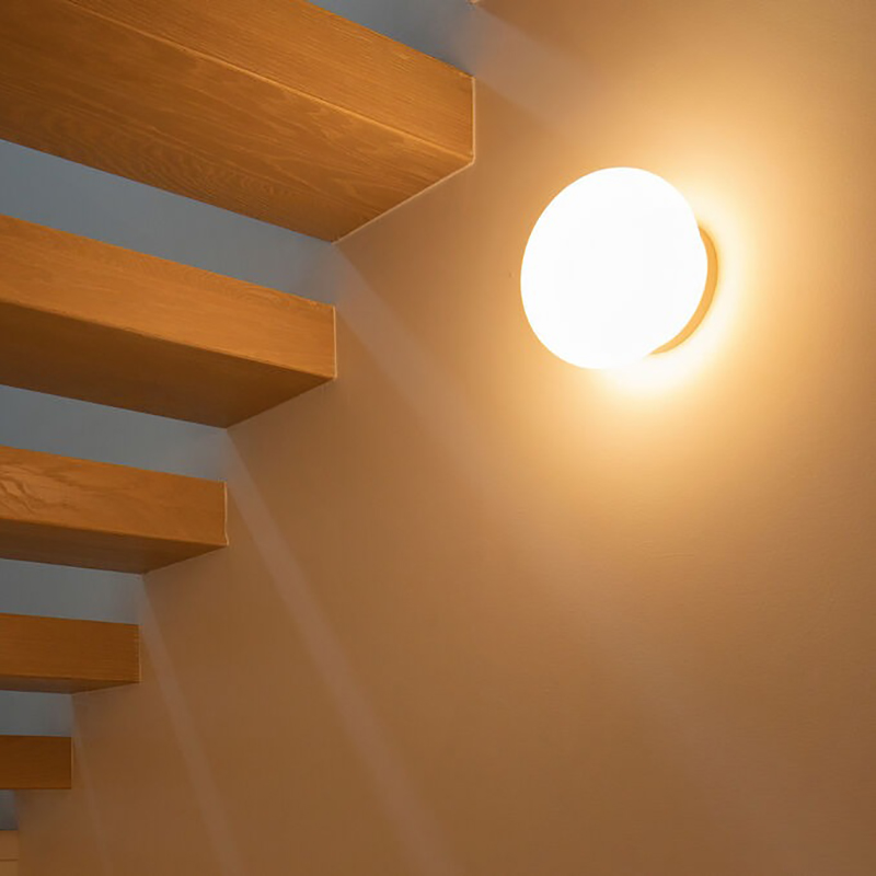 The Glo-Ball Zero Ceiling/Wall Light from Flos in a dining room.