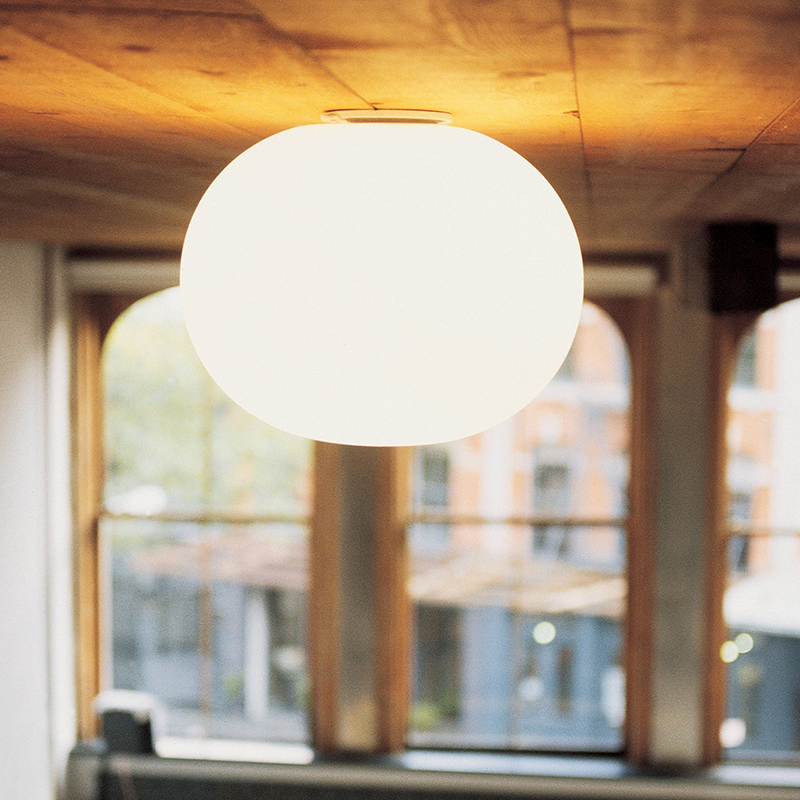 The Glo-Ball Zero Ceiling/Wall Light from Flos in a home office.