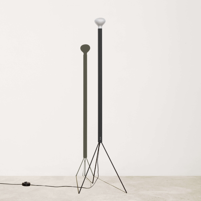 The Luminator Floor Lamp from FLOS in anthracite in a lounge.