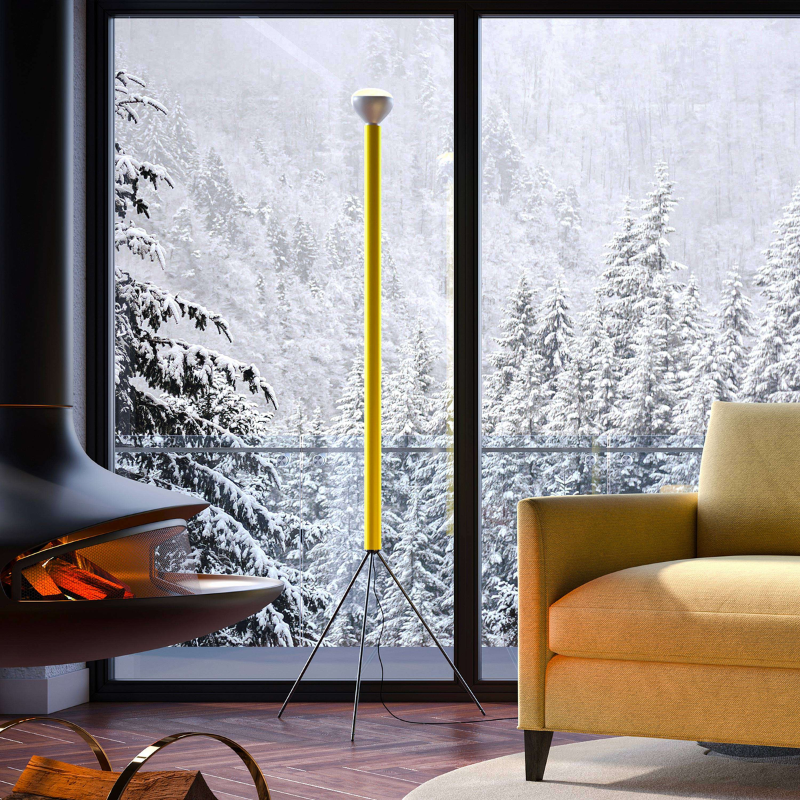 The Luminator Floor Lamp from FLOS in yellow in a lounge.