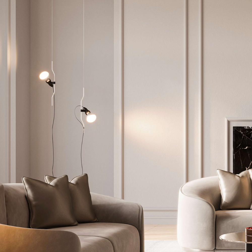 The Parentesi Lamp from Flos in White in a living room.