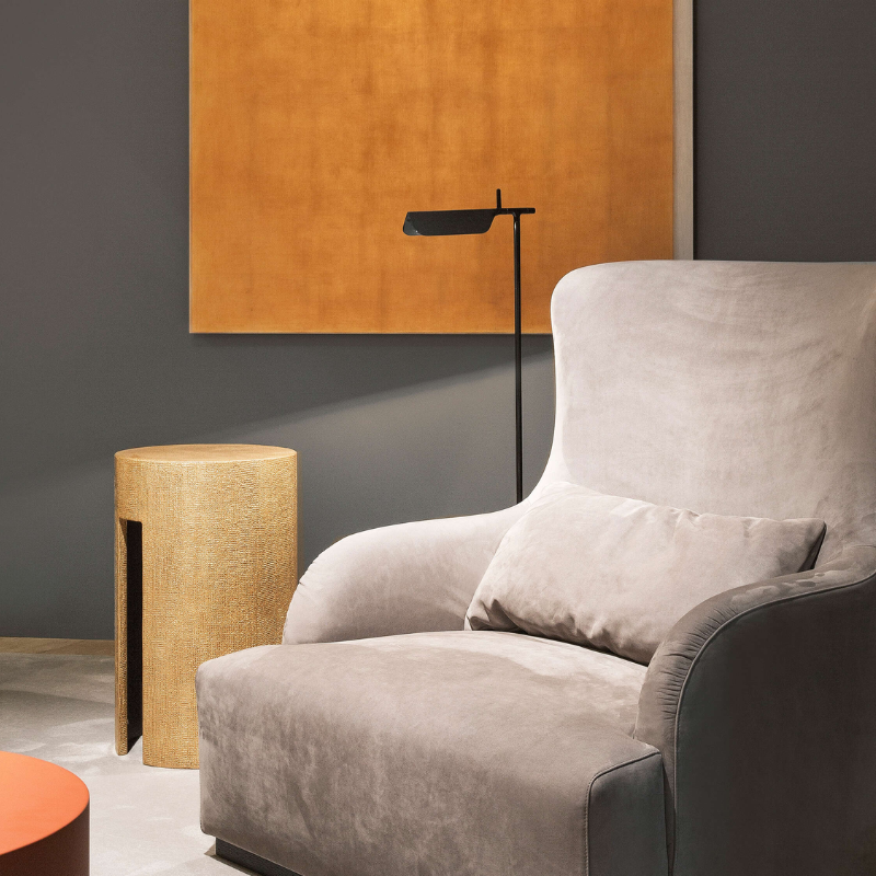 The Tab Floor Lamp from FLOS in black in a living room.