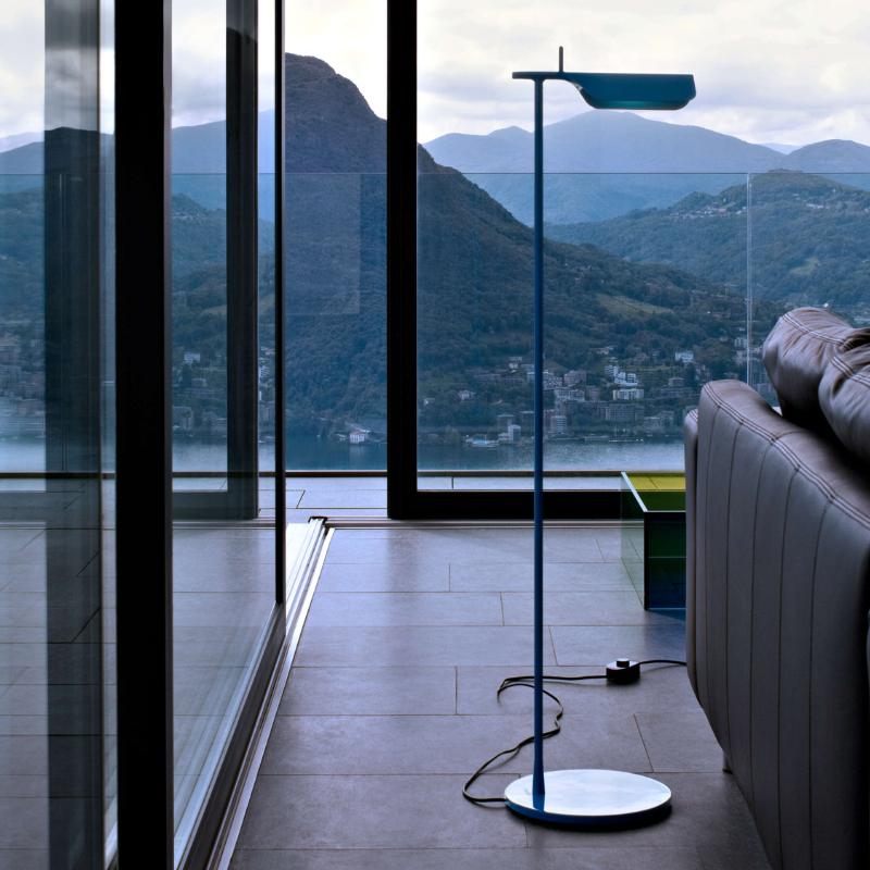 The Tab Floor Lamp from FLOS in matte blue in a designer home.
