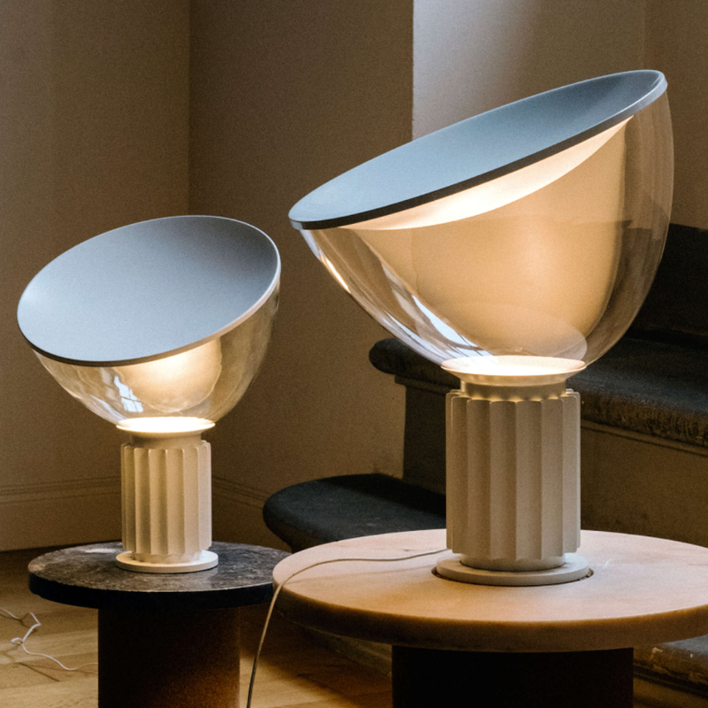 The standard and small Taccia Table Lamp from FLOS in matte white showing the size options.