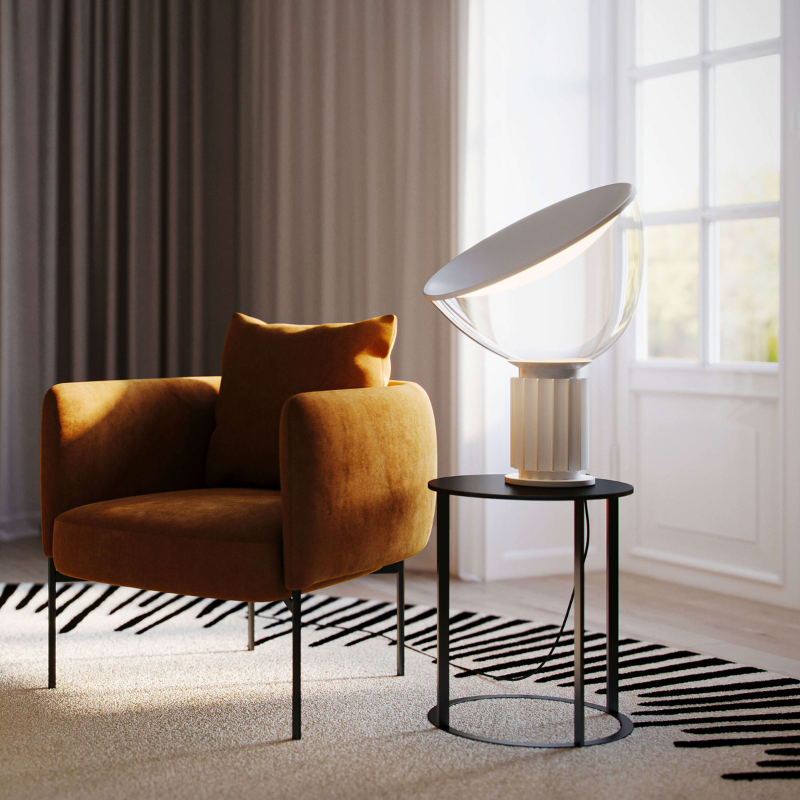 The standard Taccia Table Lamp from FLOS in matte white in a living area.