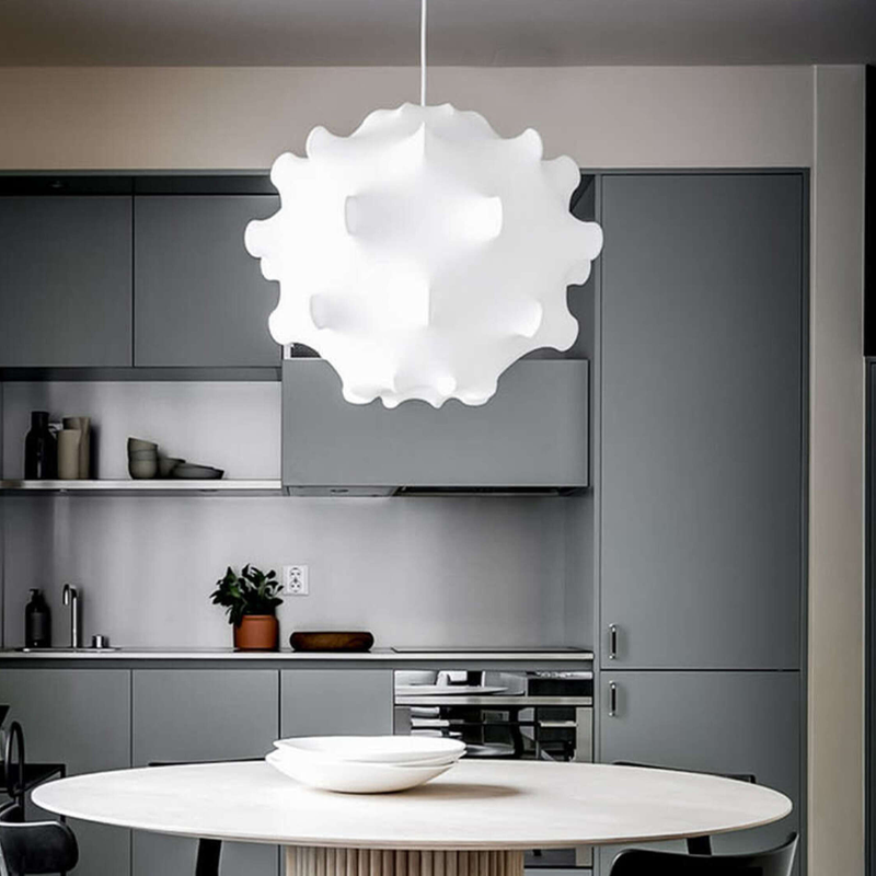 The Taraxacum 1 from FLOS in a dining room.