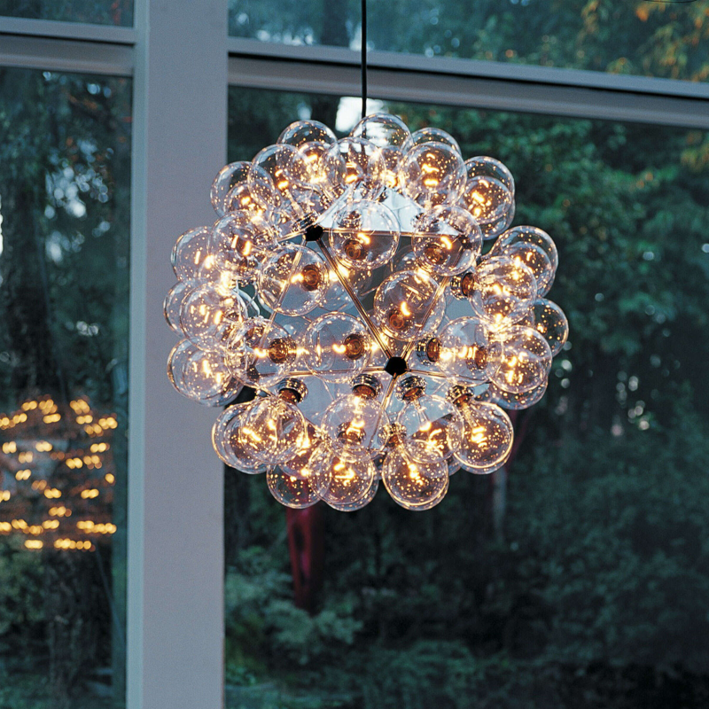 The Taraxacum 88 Suspension from FLOS in a living room.