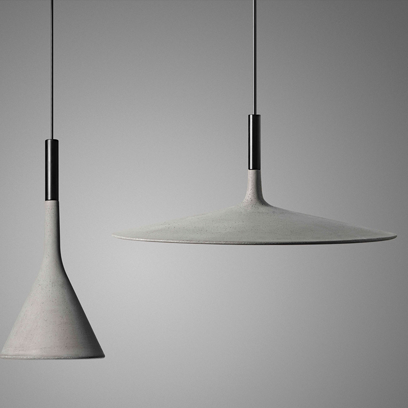 The Aplomb Large Pendant from Foscarini in concrete grey in a kitchen.
