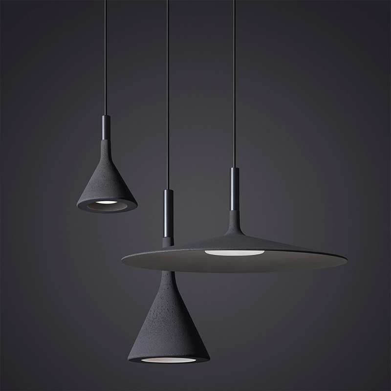 The Aplomb Pendant from Foscarini in anthracite in a living space.