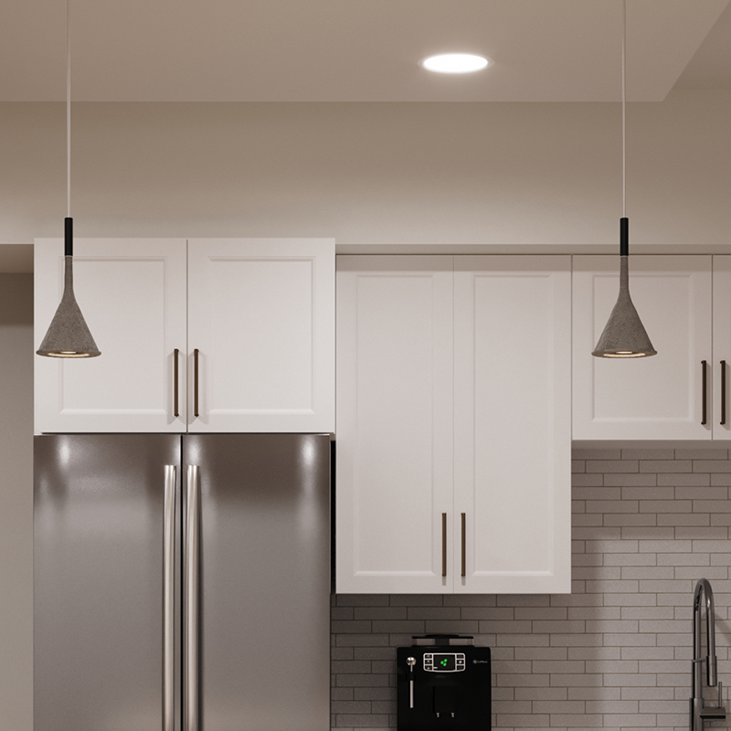 The Aplomb Pendant from Foscarini in concrete grey in a living room.