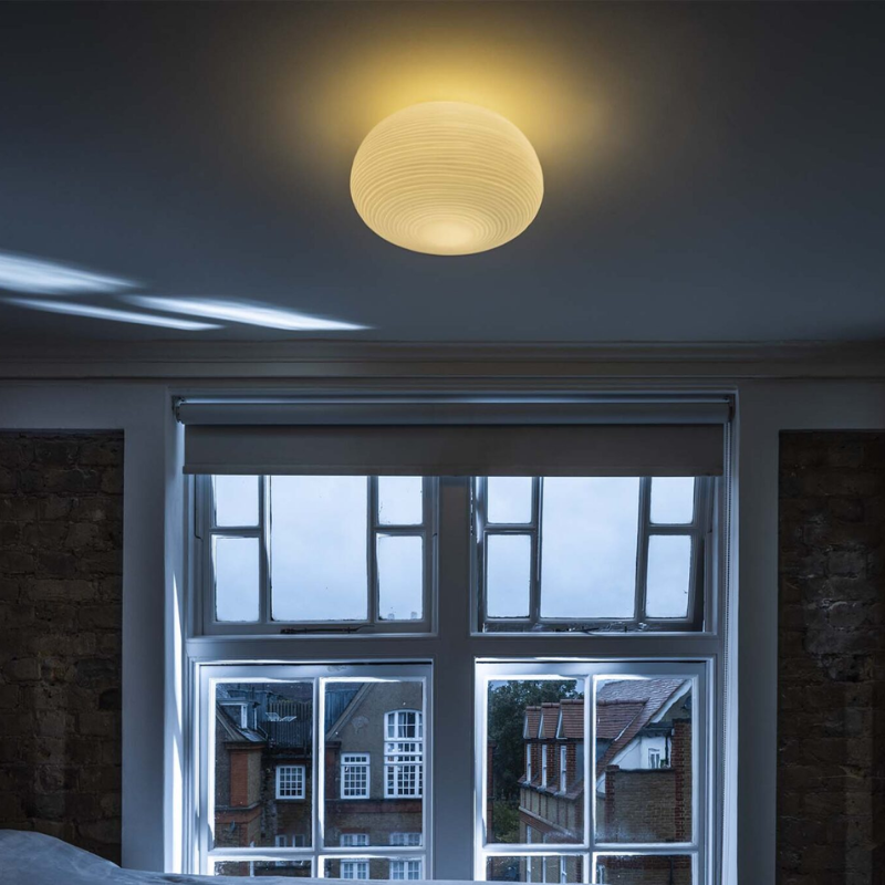 The Rituals 2 Flush Mount from Foscarini in a bedroom.