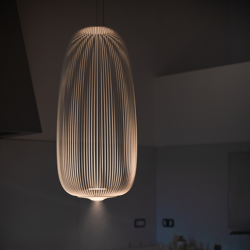 The Spokes 1 from Foscarini in white in a dining room.