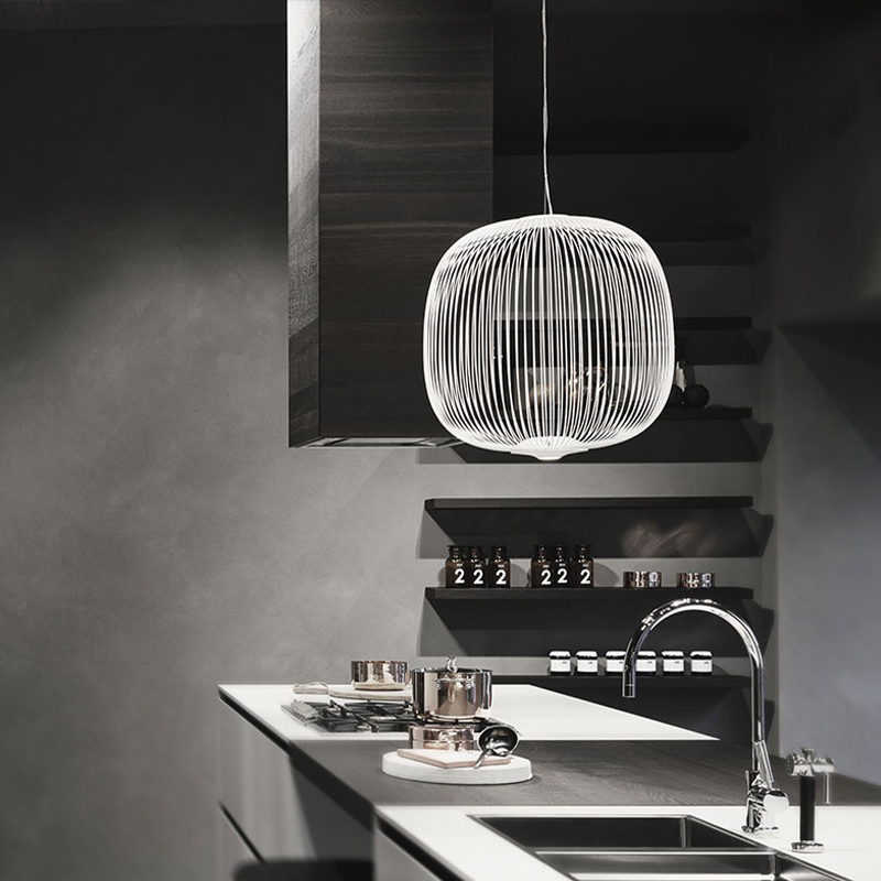 The Spokes 2 Pendant from Foscarini in midi white in a kitchen.