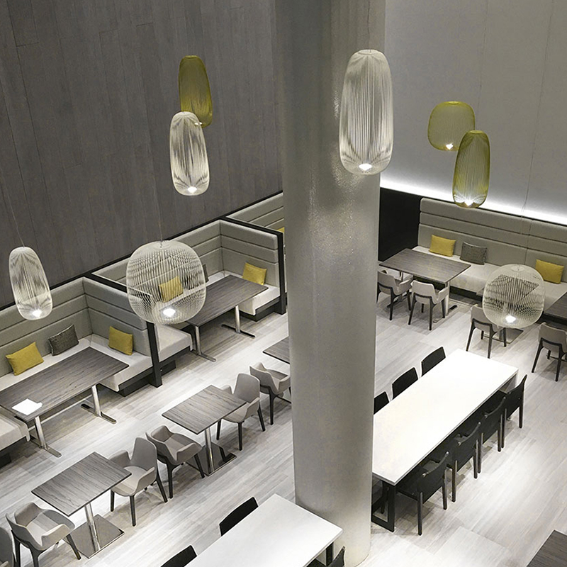 The Spokes 2 Pendant from Foscarini in a restaurant.