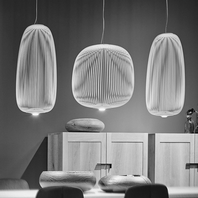 The Spokes 2 Pendant from Foscarini in white in an office.