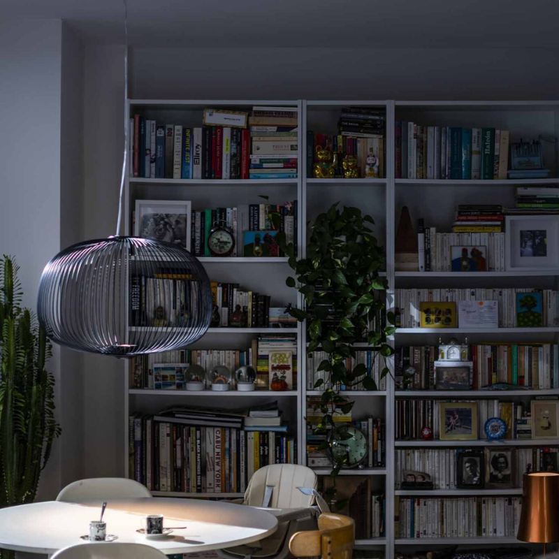 The Spokes 3 by Foscarini in black in a lounge.