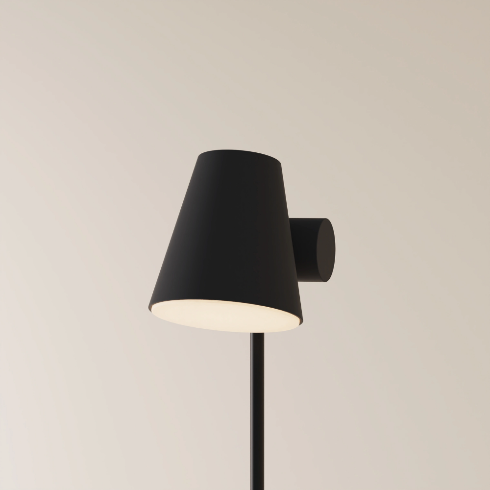 The carbon Aim Floor Light from Gantri with the black rod option.
