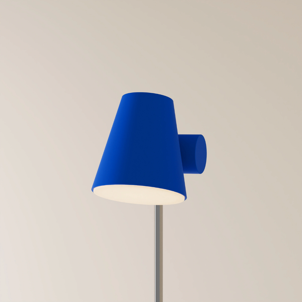 The cobalt Aim Floor Light from Gantri with the chrome rod option.