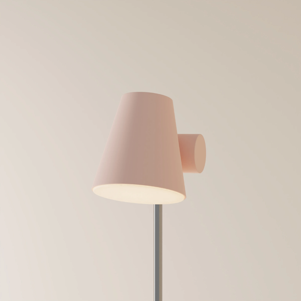 The coral Aim Floor Light from Gantri with the chrome rod option.