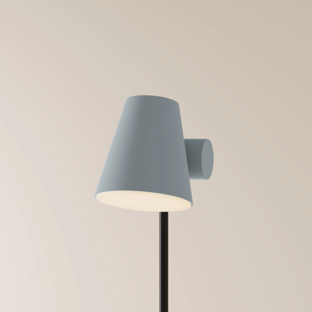 The fog Aim Floor Light from Gantri with the black rod option.