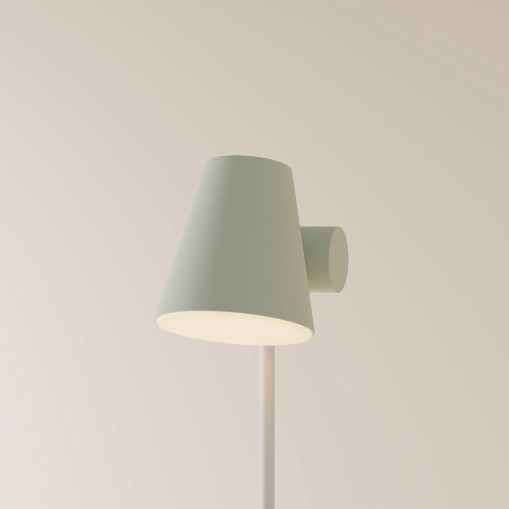 The white Aim Floor Light from Gantri with the chrome rod option.