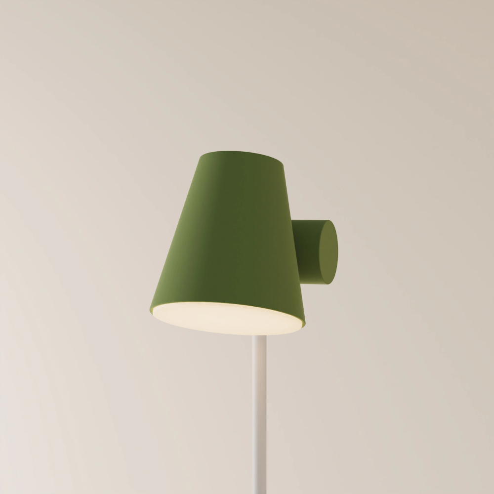 The olive Aim Floor Light from Gantri with the white rod option.