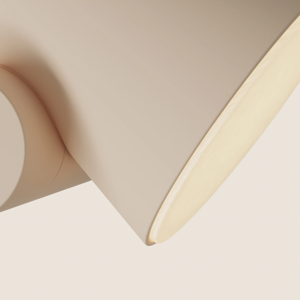 The peach Aim Floor Light from Gantri close up.