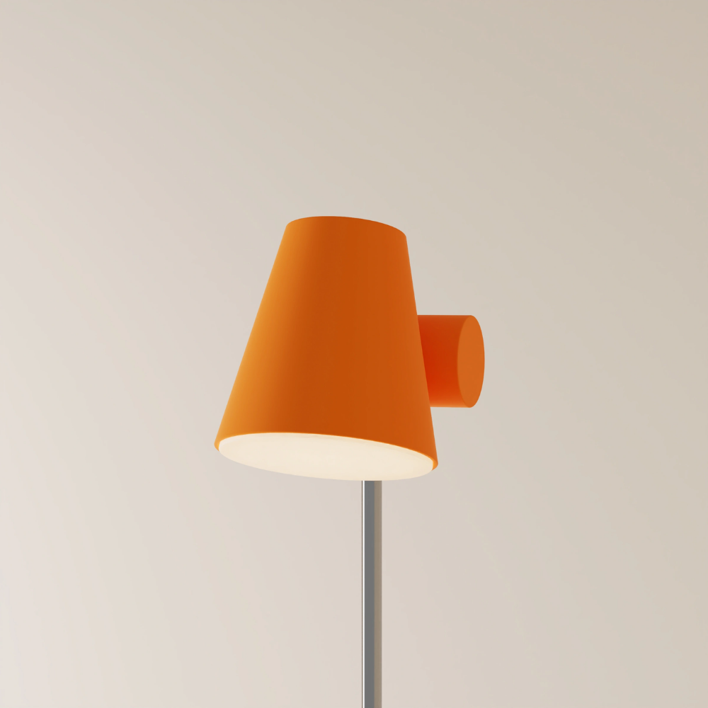 The persimmon Aim Floor Light from Gantri with the chrome rod option.