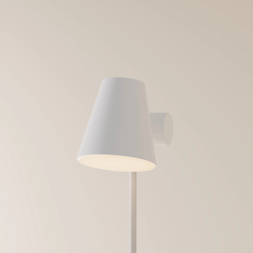 The snow Aim Floor Light from Gantri with the white rod option.