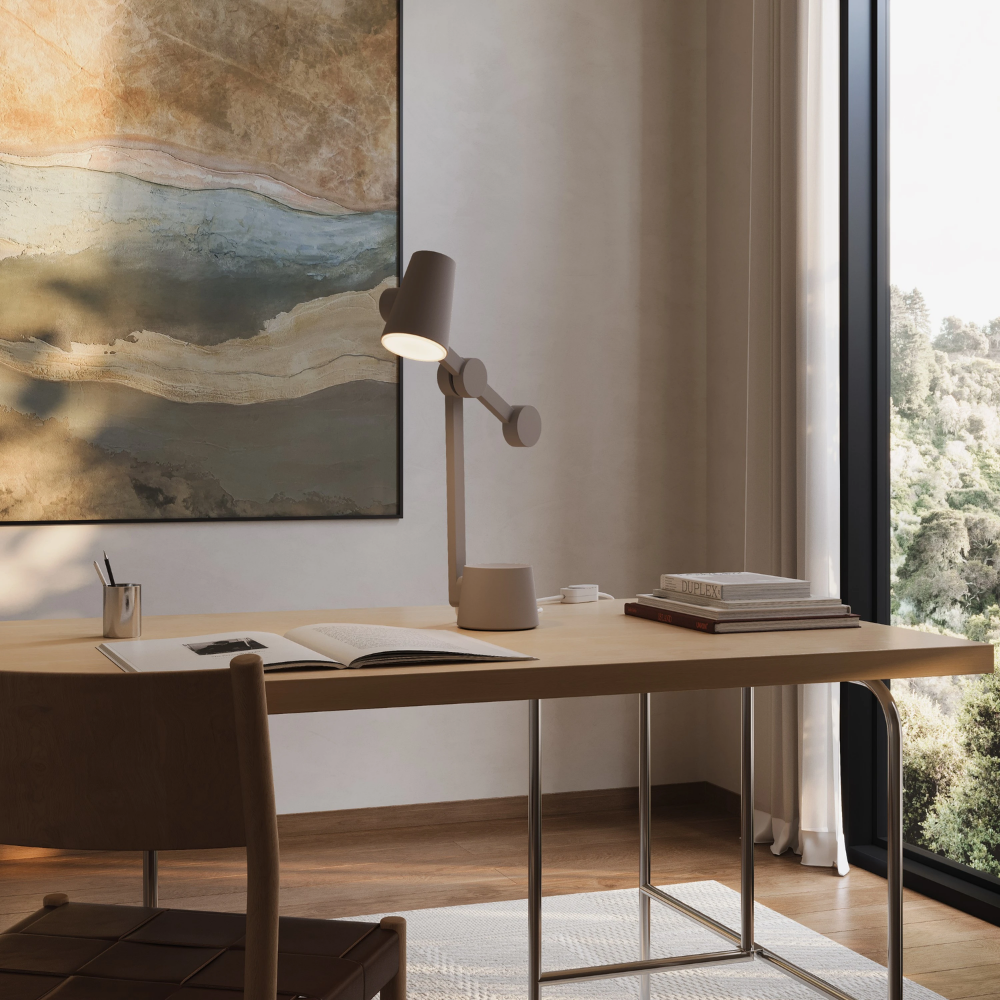 The smoke Aim Task Light from Gantri in a home office.