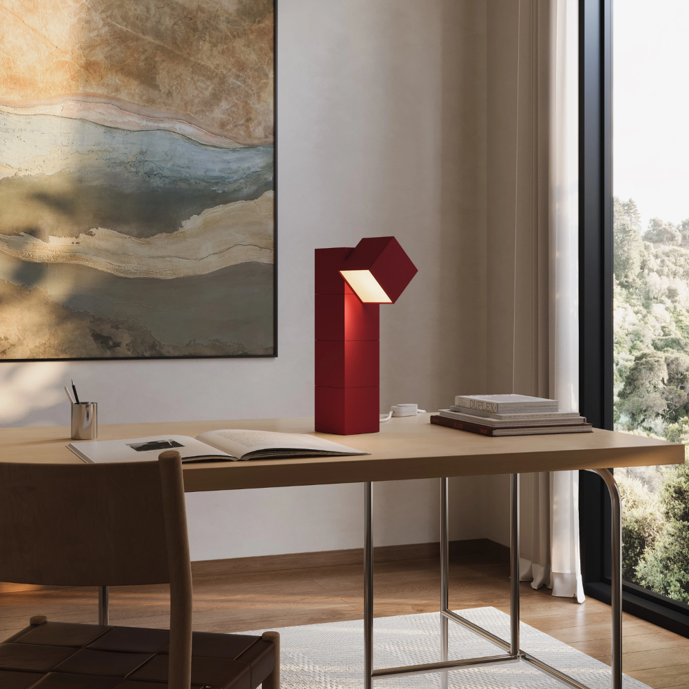 The canyon Analog Task Light from Gantri in a home office on top of a desk.