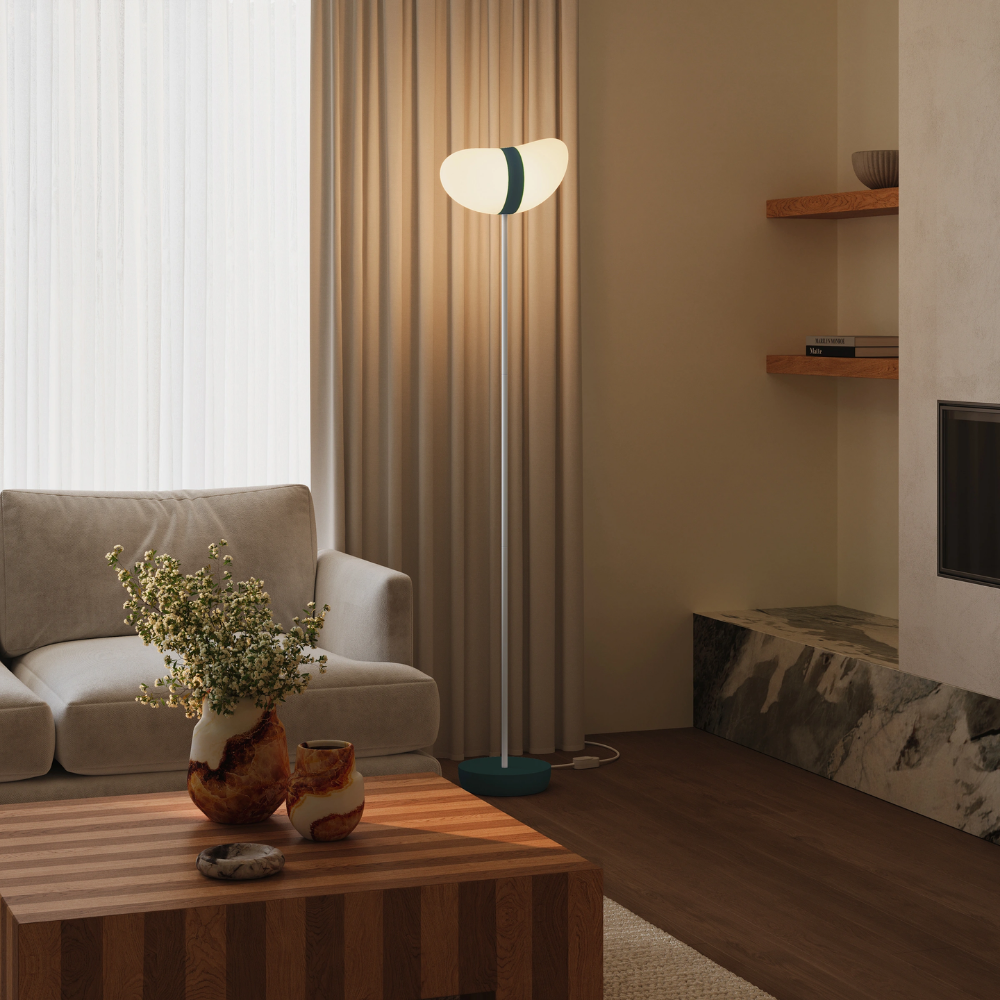 The forest Baltra Floor Light from Gantri with the white rod option in a lounge.