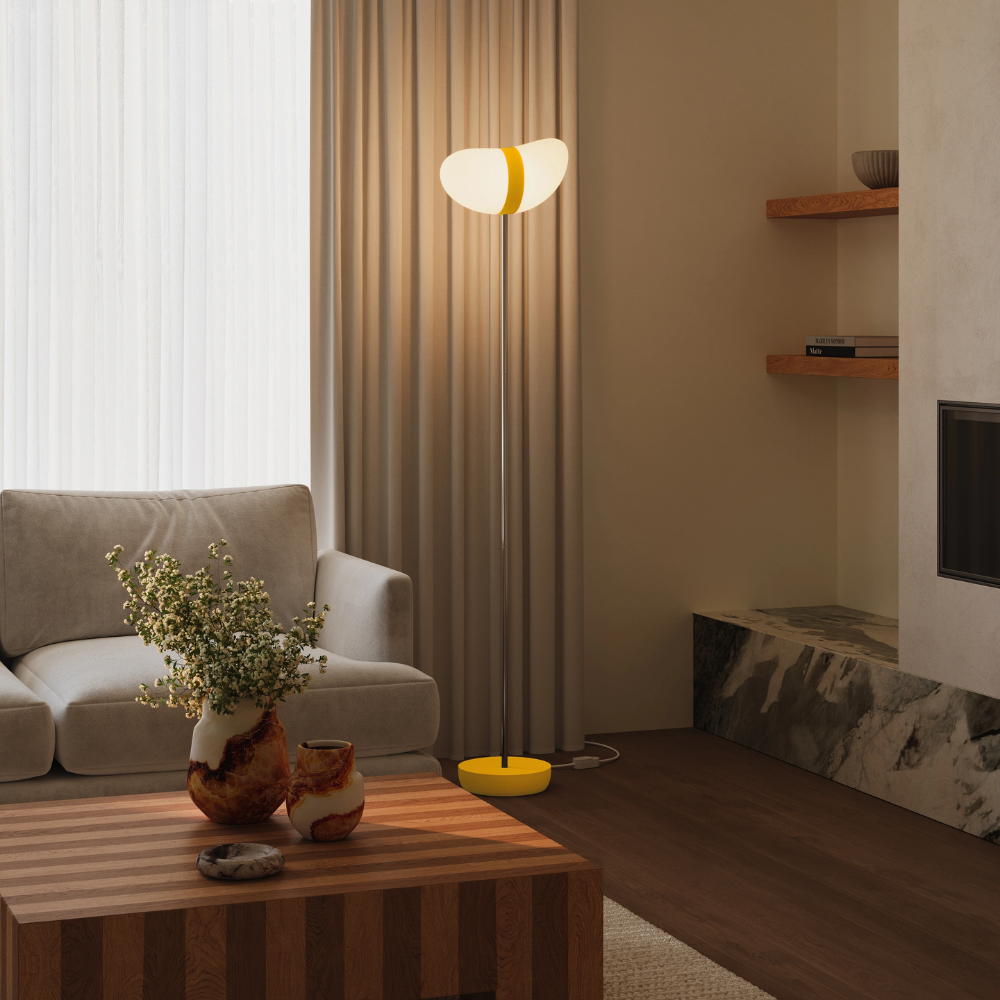 The sunrise Baltra Floor Light from Gantri with the chrome rod option in a family space.