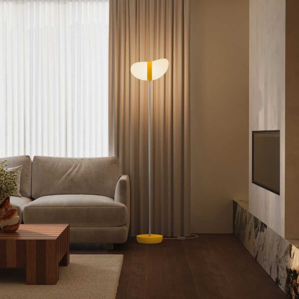 The sunrise Baltra Floor Light from Gantri with the white rod option in a lounge.