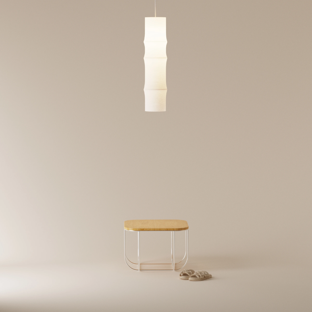 The Bamboo Large Pendant Light from Gantri with the white cord in a bedroom.
