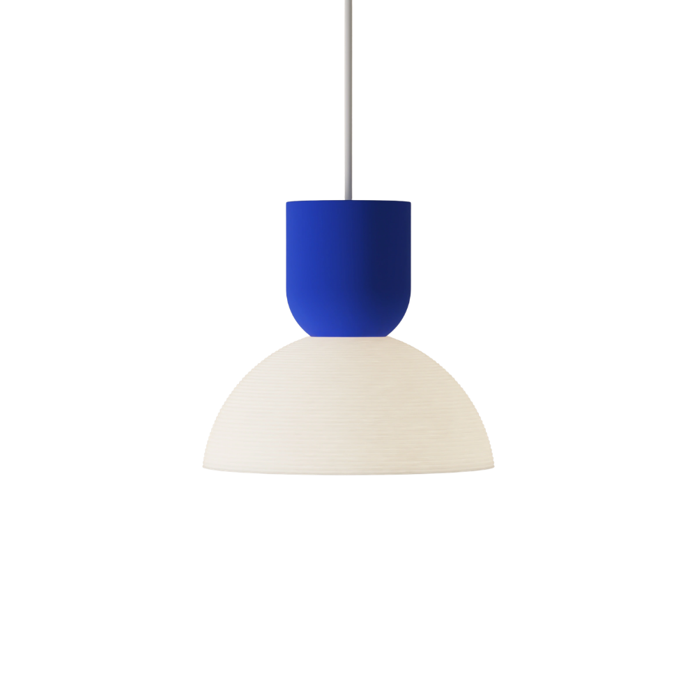 The cobalt Buia Pendant Light from Gantri with the white cord.