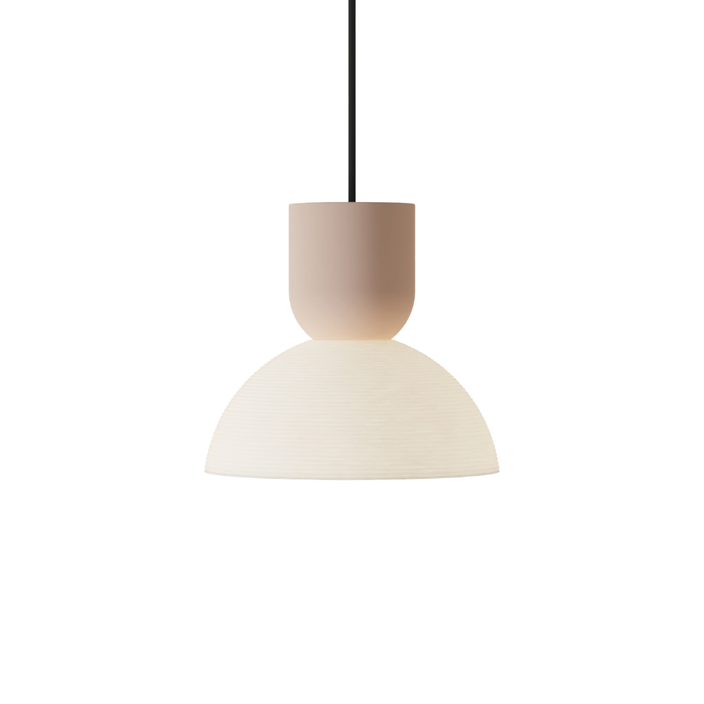 The coral Buia Pendant Light from Gantri with the black cord.