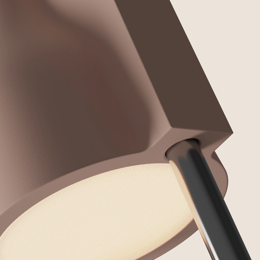 The coral Carve Floor Light from Gantri with the chrome rod option close up.