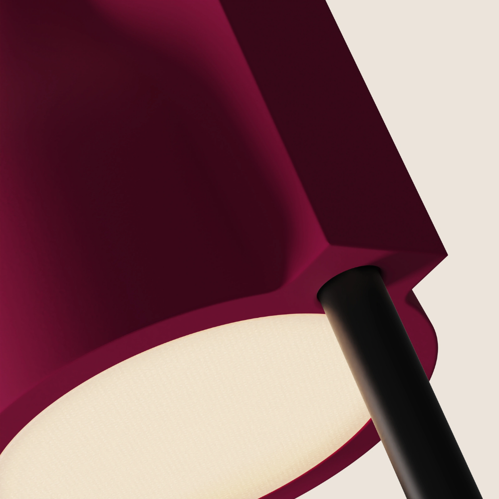 The hibiscus Carve Floor Light from Gantri with the black rod option close up.