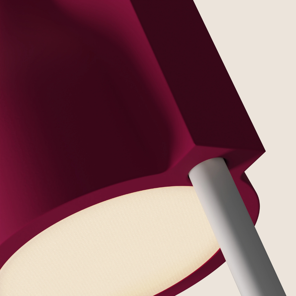The hibiscus Carve Floor Light from Gantri with the white rod option close up.