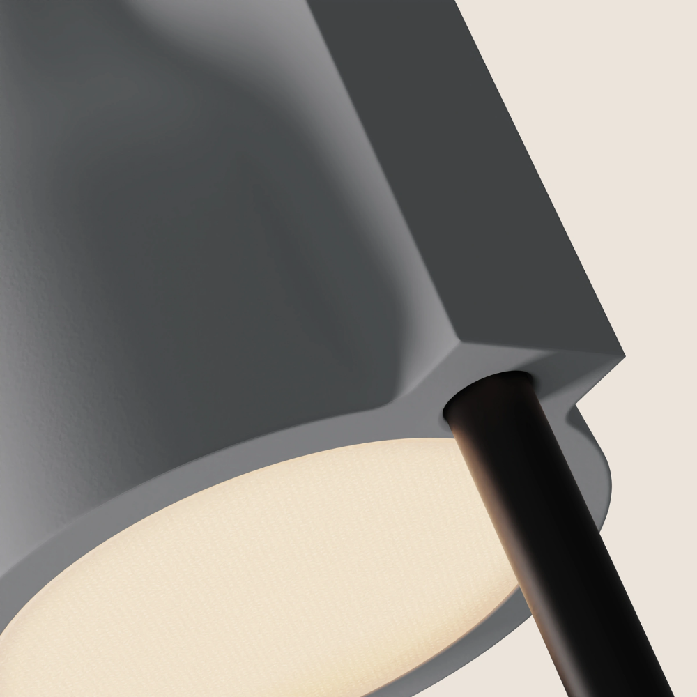 The mist Carve Floor Light from Gantri with the black rod option close up.
