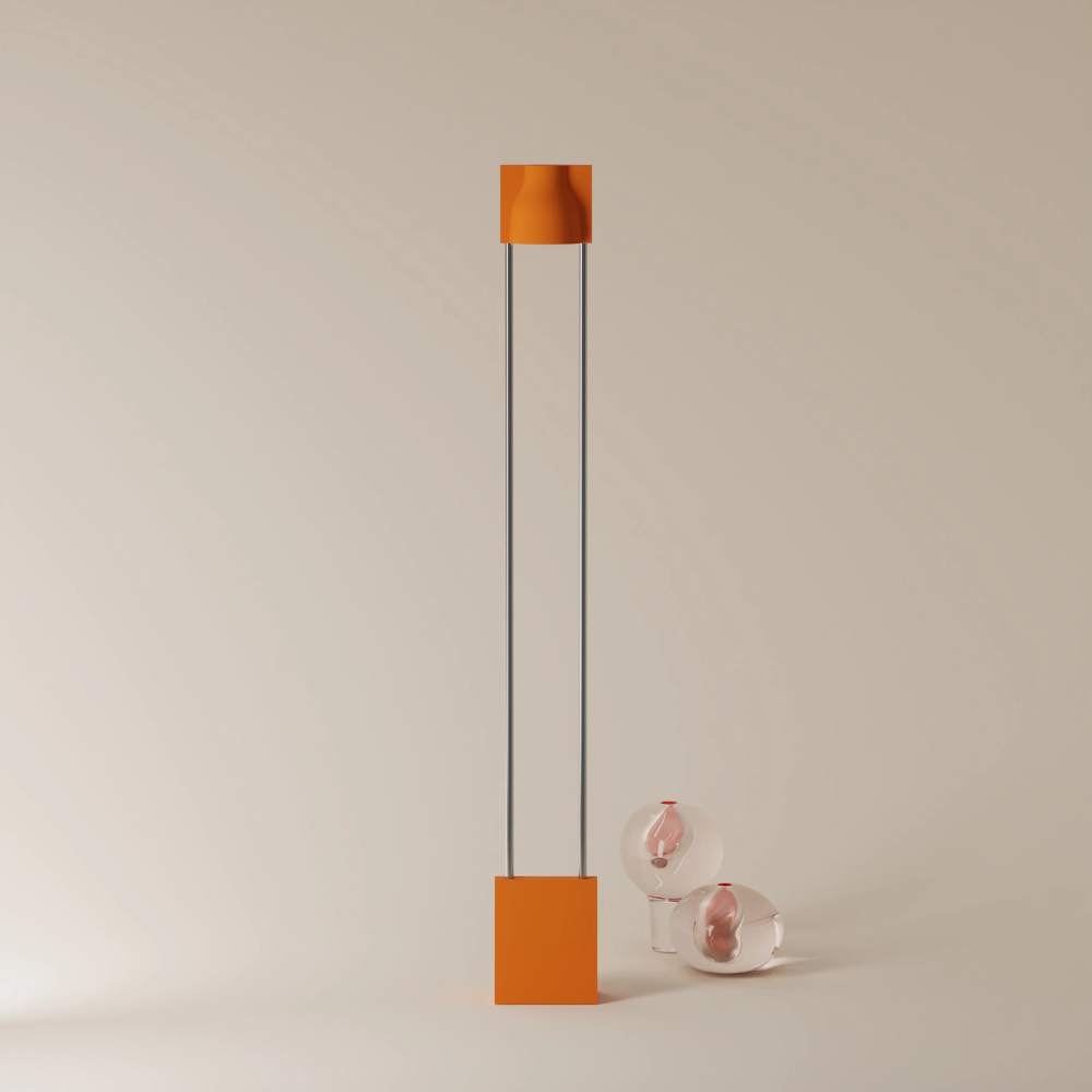 The persimmon Carve Floor Light from Gantri with the chrome rod option.