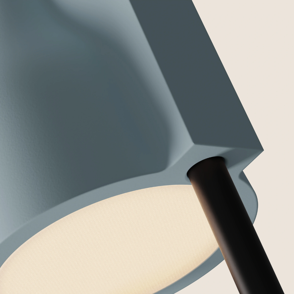 The sky Carve Floor Light from Gantri with the black rod option close up.
