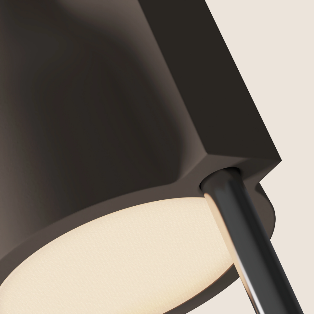 The smoke Carve Floor Light from Gantri with the chrome rod option close up.