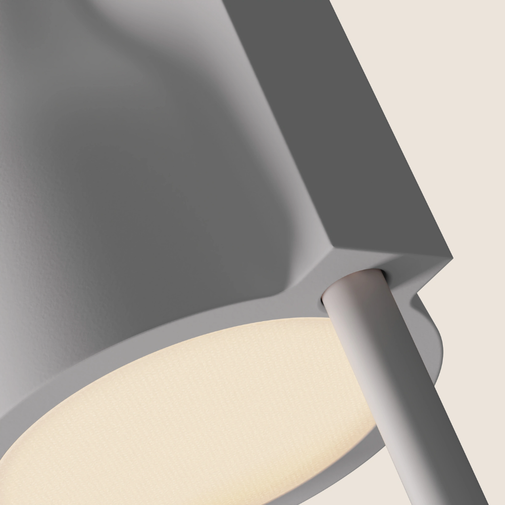 The snow Carve Floor Light from Gantri with the white rod option close up.