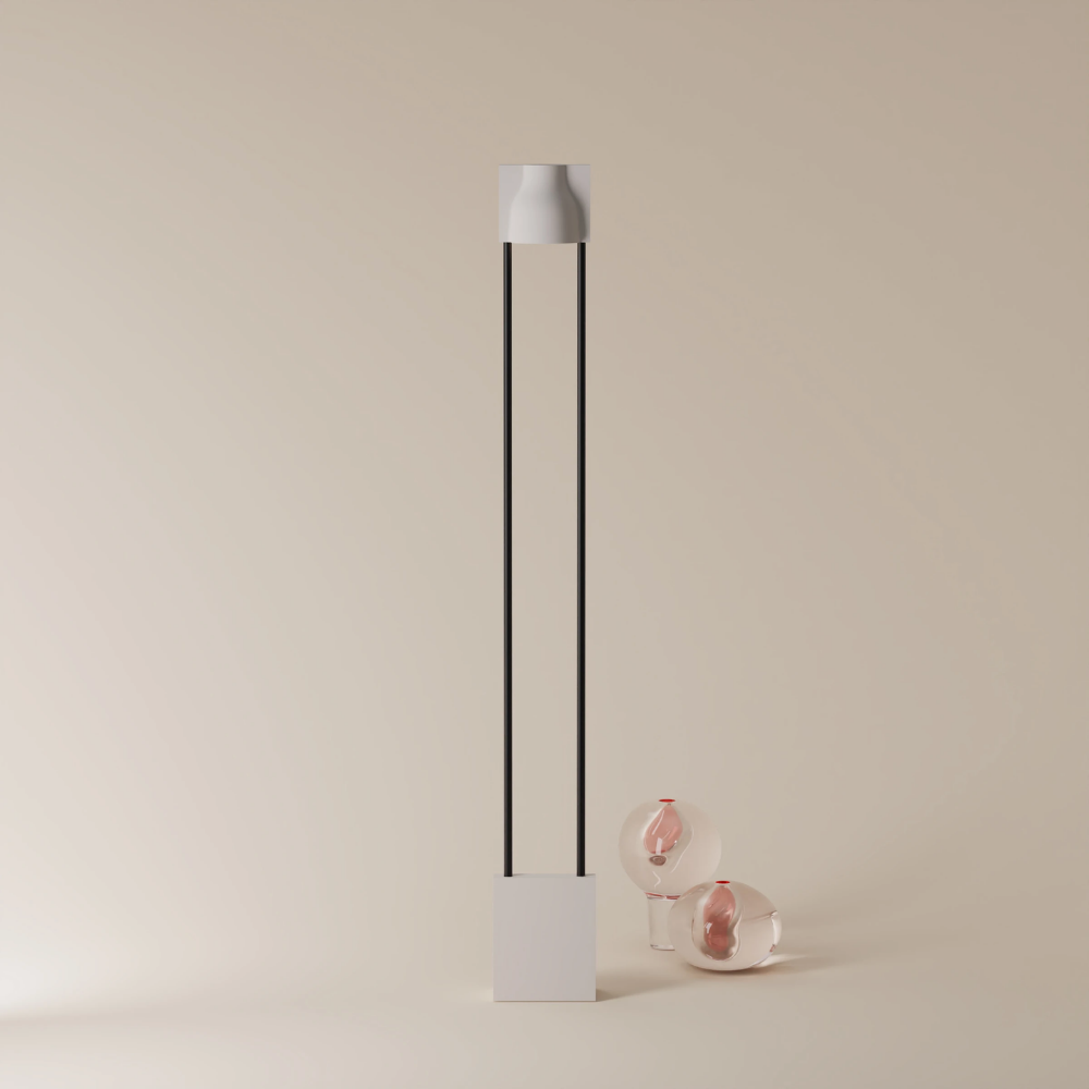 The stone Carve Floor Light from Gantri with the black rod option.